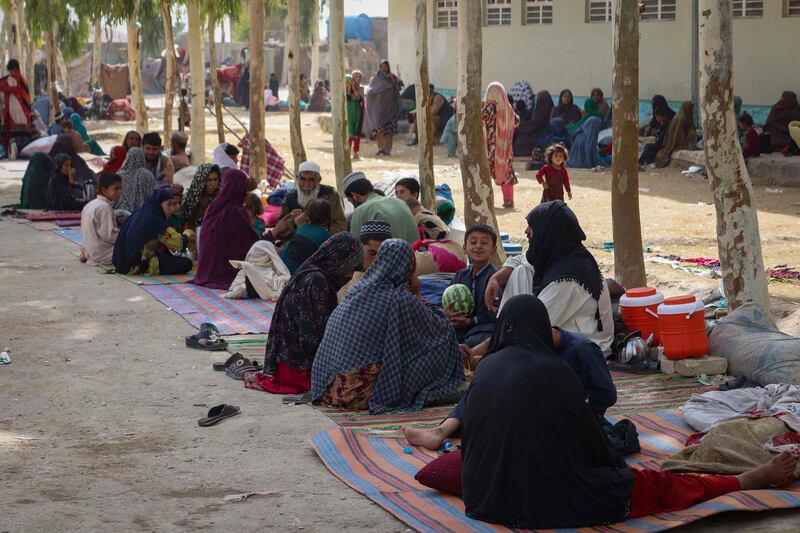 Displaced Afghan families at a refugee camp in Kandahar, Afghanistan, after fleeing the fighting between the Taliban and Afghan security forces. AFP