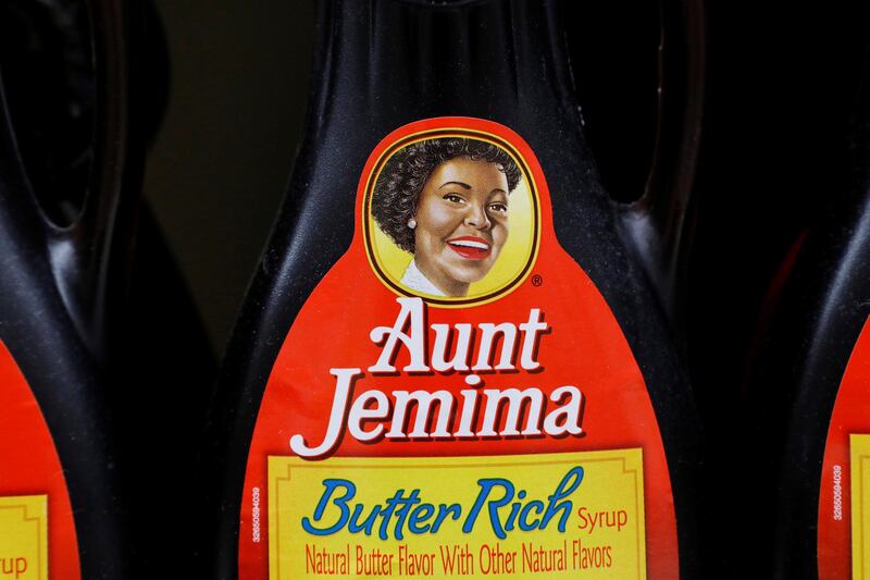 Bottles of Aunt Jemima branded syrup stand on a store shelf inside of a shop in the Brooklyn borough of New York City, New York, U.S., June 17, 2020. REUTERS/Brendan McDermid