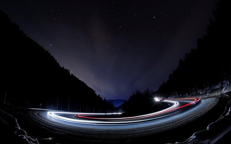 Traffic flows on the 'Yenisei' federal highway in the Siberian Taiga area, outside Krasnoyarsk, Russia. Reuters