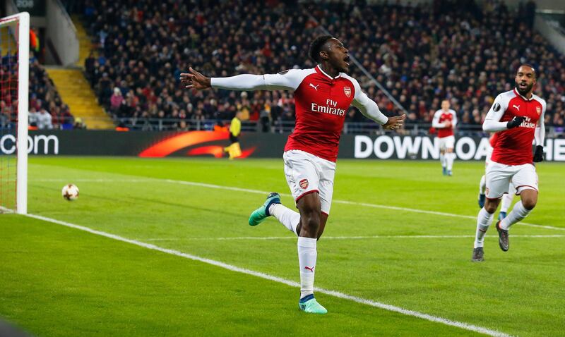 epa06665242 Danny Welbeck (L) of Arsenal celebrates after scoring his team's first goal during the UEFA Europa League quarter final, second leg soccer match between CSKA Moscow and Arsenal FC in Moscow, Russia, 12 April 2018.  EPA/SERGEI ILNITSKY