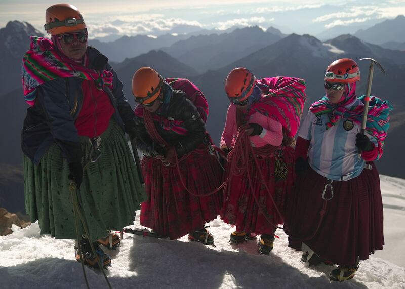 Female members of a climbing team at the top of Huayna Potosi mountain, near El Alto, Bolivia. The group, called the Climbing Cholitas of Bolivia Warmis, campaigns for the rights of indigenous women through mountaineering. AFP
