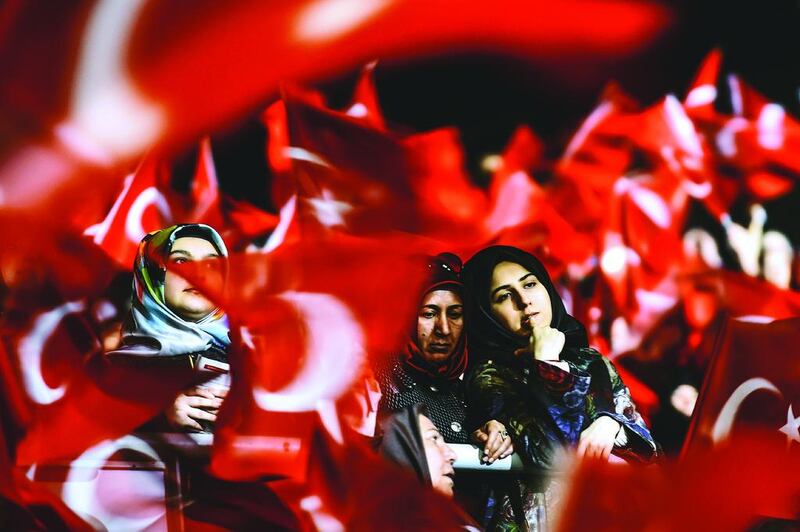 Women at a ‘Yes’ pro-government referendum rally on March 5, in Istanbul. Ozan Kose / AFP.