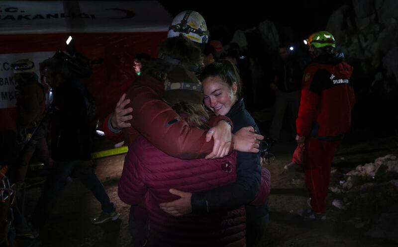 Caver friends of Mr Dickey celebrate as his rescue operation comes to a successful end. Reuters