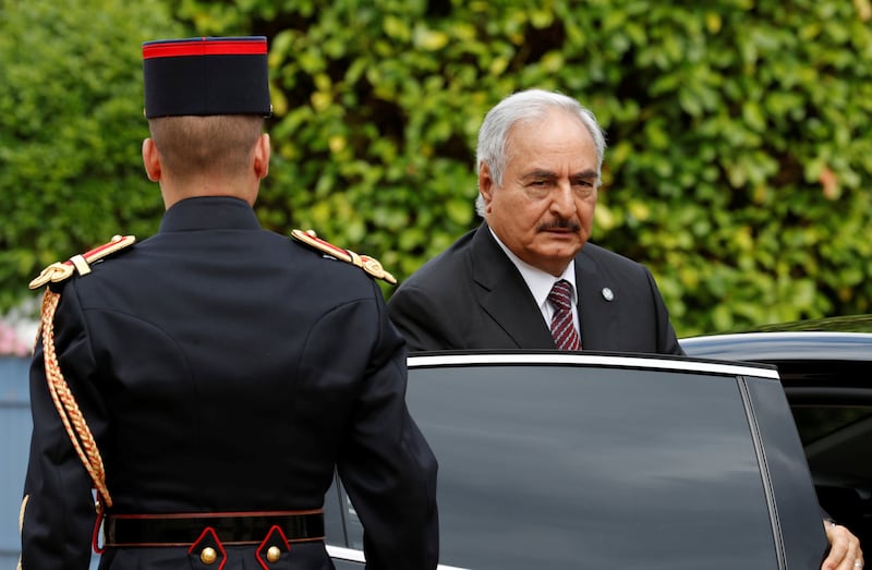 General Khalifa Haftar, commander in the Libyan National Army (LNA), arrives to attend a meeting for talks over a political deal to help end Libya’s crisis in La Celle-Saint-Cloud near Paris, France, July 25, 2017.  REUTERS/Philippe Wojazer