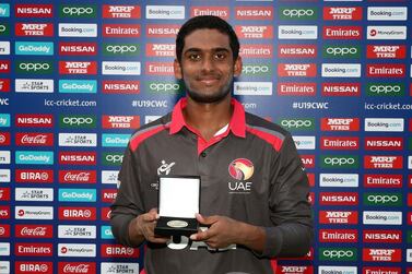 Jonathan Figy with the player of the match award after his century helped UAE defeat Canada at the U19 World Cup in South Africa. Courtesy ICC