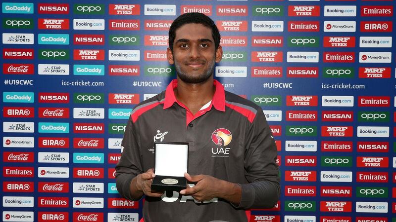 UAE batsman Jonathan Figy poses with the player of the match award after the UAE's victory over Canada in the Under 19 Cricket World Cup. Courtesy ICC 