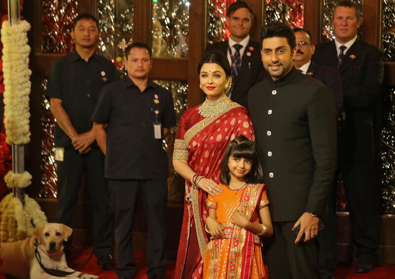 Actor Abhishek Bachchan, his wife actress Aishwarya Rai and their daughter Aaradhya arrive. Reuters
