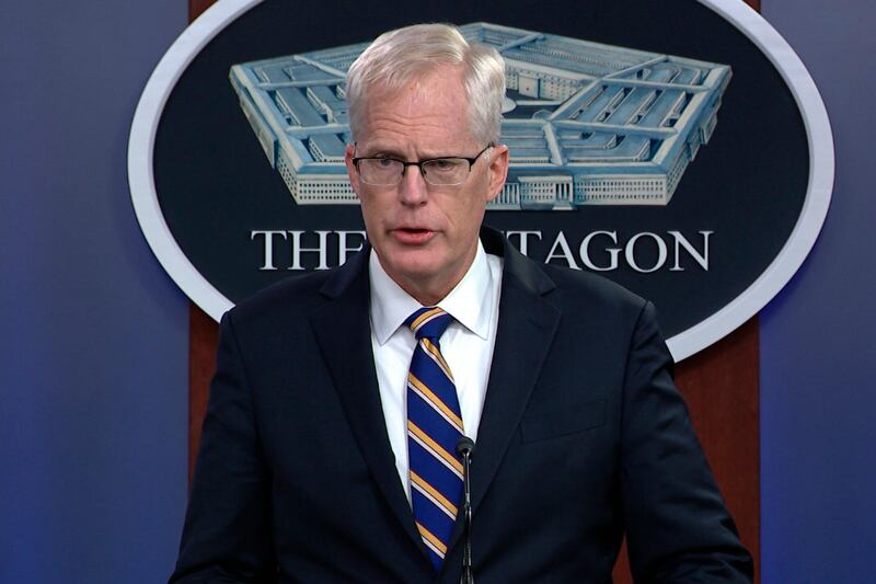 In this Tuesday, Nov. 17, 2020, image taken from a video provided by Defense.gov Acting Defense Secretary Christopher Miller speaks at the Pentagon in Washington. Miller said Tuesday that the U.S. will reduce troop levels in Iraq and Afghanistan by mid-January, asserting that the decision fulfills President Donald Trumpâ€™s pledge to bring forces home from America's long wars even as Republicans and U.S. allies warn of the dangers of withdrawing before conditions are right. (Defense.gov via AP)