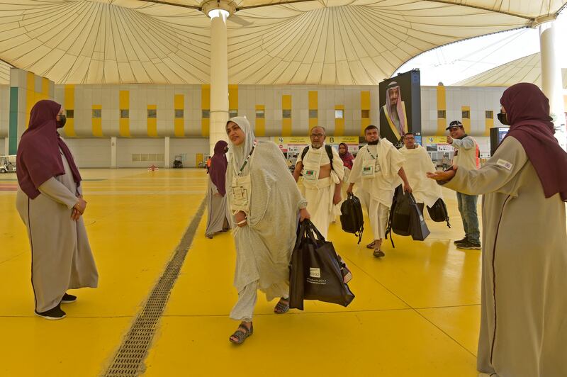 Hajj employees welcome pilgrims at King Abdulaziz International Airport in Jeddah. AFP