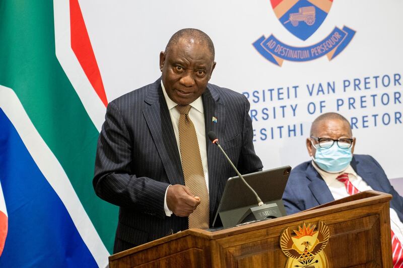 South African President Cyril Ramaphosa delivers a speech at the University of Pretoria Future Africa in Pretoria, South Africa, Friday May 28, 2021. French President Emmanuel Macron and Ramaphosa are launching a program su support African vaccine production, a project backed by the European Union, the United States and the World Bank. (AP Photo/Jerome Delay)