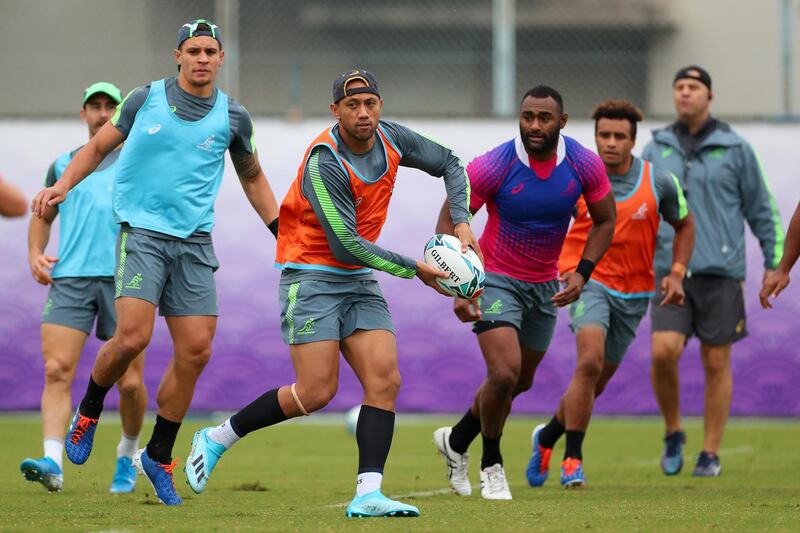 Christian Lealiifano of Australia looks for a pass during training. Getty