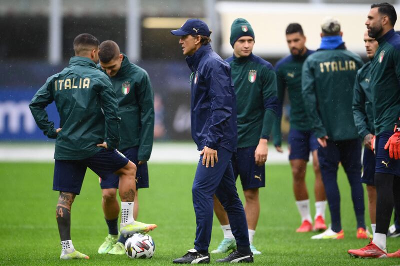 Italy manager Roberto Mancini supervises a training session at the San Siro in Milan on the eve of their Uefa Nations League match against Spain. AFP
