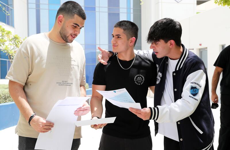 From left to right, Mohammed Soufi, Ibrahim Ismaeili and Mikail Sheikh after receiving their results.