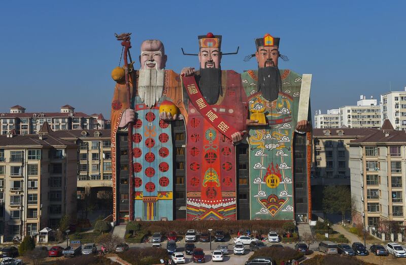 A hotel with its exterior featuring Chinese deities Fu, Lu and Shou, which symbolize happiness, prosperity and longevity, is seen in Langfang, Hebei province, China November 20, 2017. Picture taken November 20, 2017. REUTERS/Stringer ATTENTION EDITORS - THIS IMAGE WAS PROVIDED BY A THIRD PARTY. CHINA OUT.    NO RESALES. NO ARCHIVES.