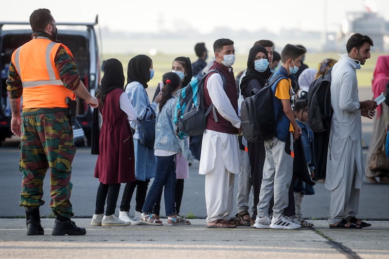Citizens arrive in Belgium after being flown to safety from Afghanistan. EPA