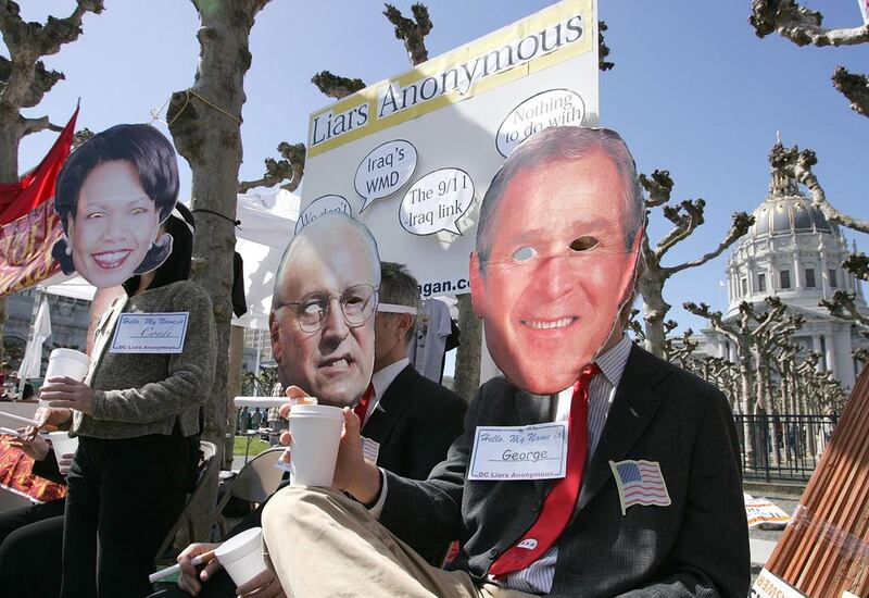 Anti-war demonstrators lampooning Rice, Cheney and Bush on the third anniversary of the invasion of Iraq. Justin Sullivan / AFP / Getty Images