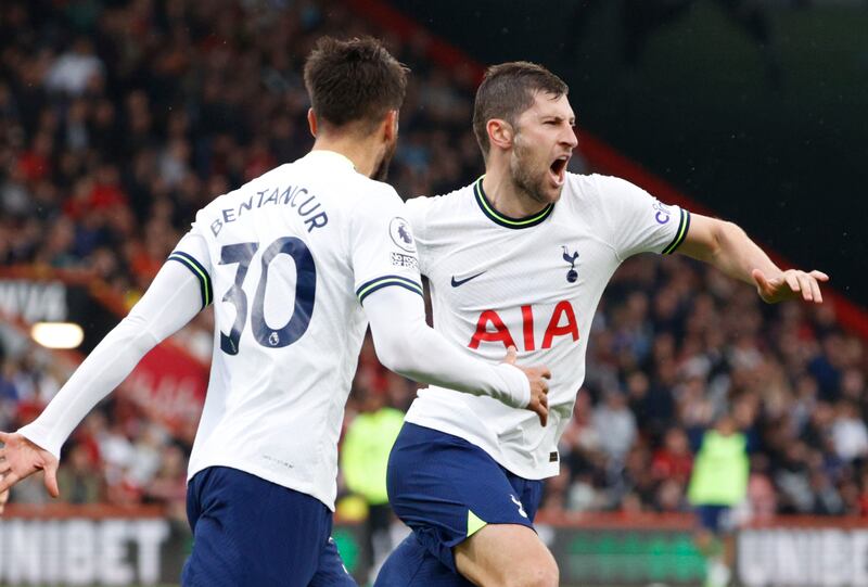 Tottenham's Ben Davies celebrates with Rodrigo Bentancur after levelling. AP
