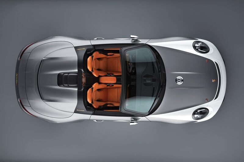 The open-top sports car features a fuel cap in the middle of its bonnet. Porsche