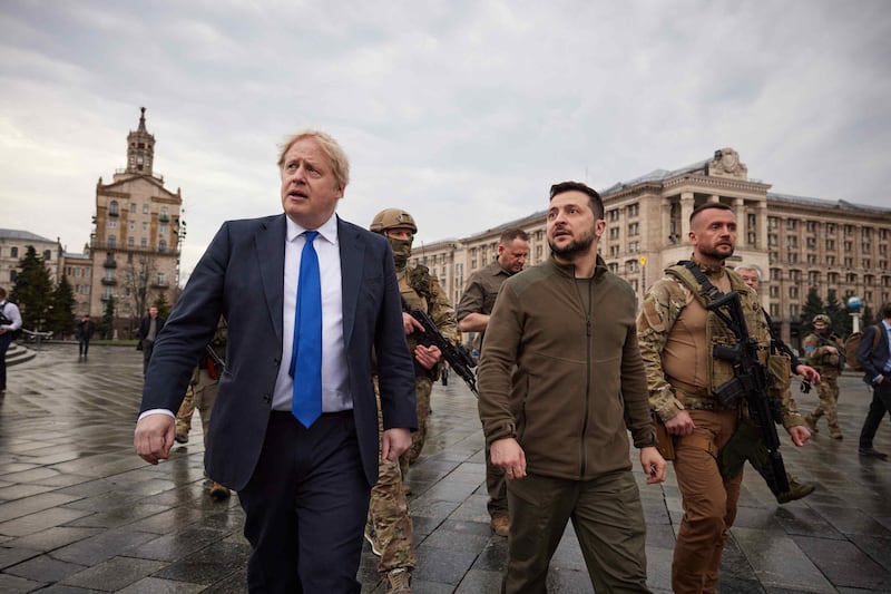 British Prime Minister Boris Johnson walks with Mr Zelenskyy in Independence Square during his visit to Kyiv on April 9. PA