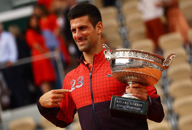 Novak Djokovic celebrates winning his 23rd Grand Slam. Reuters