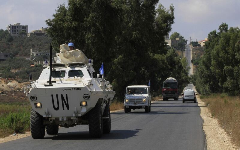 United Nations Interim Forces in Lebanon (UNIFIL) vehicles patrol along the border between Lebanon and Israel in the southern Lebanese town of Khiam on September 9, 2019. Hezbollah said it had shot down an "Israeli drone" as it crossed the border into Lebanon, a week after a flash confrontation between the arch-foes. / AFP / Mahmoud ZAYYAT
