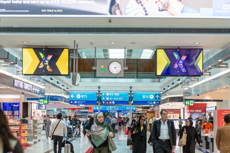 Dubai International's operator says retail and restaurant spending have 'never been higher' as travel-deprived passengers take the opportunity to indulge in shopping.