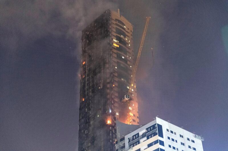 SHARJAH, UNITED ARAB EMIRATES. 05 MAY 2020. STANDALONE. Fire at the Abbco Tower near Nahda Park in Sharjah. Police and fire fighters responded to a blaze that was reported after 8:30. (Photo: Antonie Robertson/The National) Journalist: Salam Al Amir. Section: National.