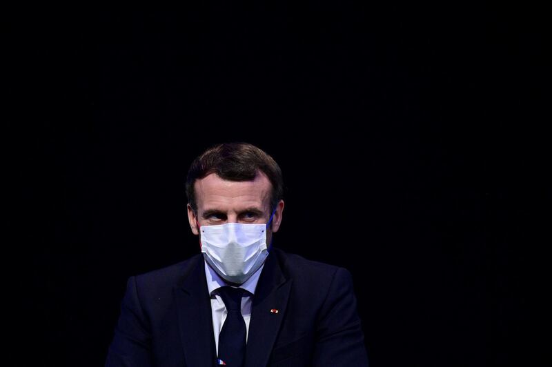 Macron attends a ceremony marking the 60th anniversary of the creation of the Organisation for Economic Co-operation and Development in Paris on December 14. AFP