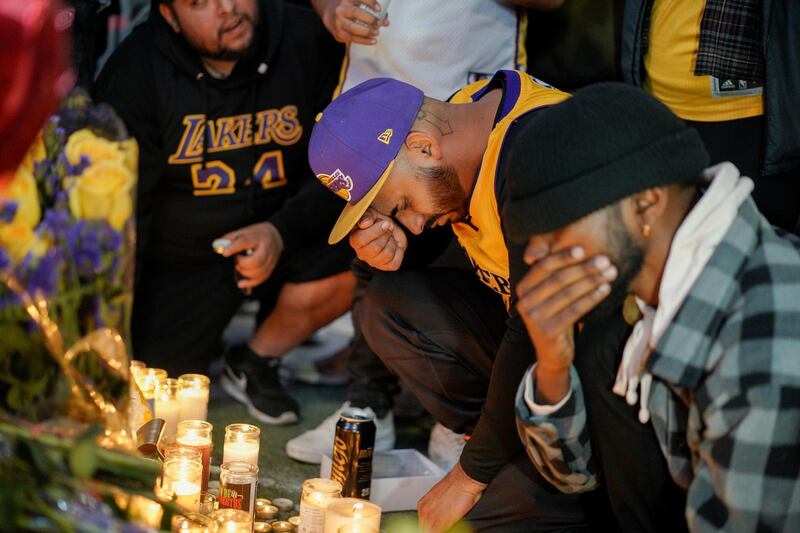 Mourners gather in Microsoft Square near the Staples Center to pay respects to Kobe Bryant after a helicopter crash killed the retired basketball star, in Los Angeles, California, U.S. REUTERS