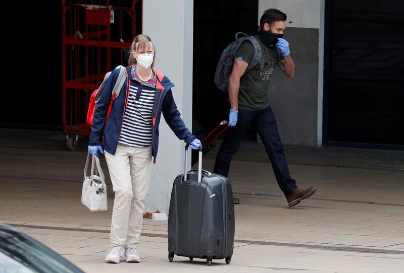 Passengers arrive at Manchester airport following the outbreak of the coronavirus disease (COVID-19), Manchester, Britain, May 10, 2020. REUTERS/Phil Noble