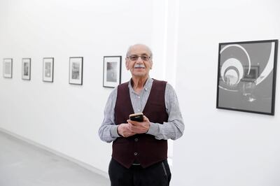 SHARJAH , UNITED ARAB EMIRATES , MARCH 15  – 2017 :- Latif Al Ani , artist with his work during the opening of the exhibition at Sharjah Art Foundation in Sharjah. ( Pawan Singh / The National ) For Arts & Life. Story by Melissa
