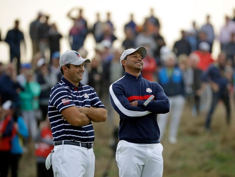 Tiger Woods of the US, right, and Patrick Reed of the US were a pairing. AP Photo