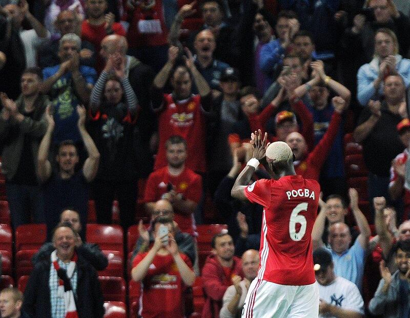 Manchester United’s Paul Pogba applauds supporters during his debut with the club last week against Southampton. Peter Powerll / EPA