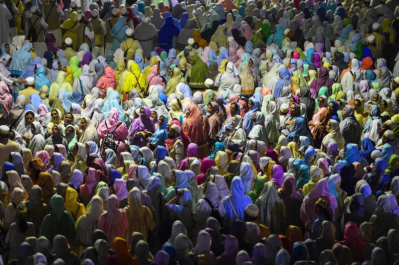 Muslim women pilgrims of the Dawoodo Bohra community take part in a Bohra ceremony in Colombo on September 8, 2019, in the run up to Ashura, one of the holiest days in Shiite Islam and commemorates the 7th century martyrdom of Prophet Mohammed’s grandson. - Ashura is one of the most important festivals for Shiite Muslims, and falls on the 10th day of Muharram, which is the mourning period for the seventh-century killing of Imam Hussein, the grandson of the Prophet Muhammad. (Photo by ISHARA S. KODIKARA / AFP)