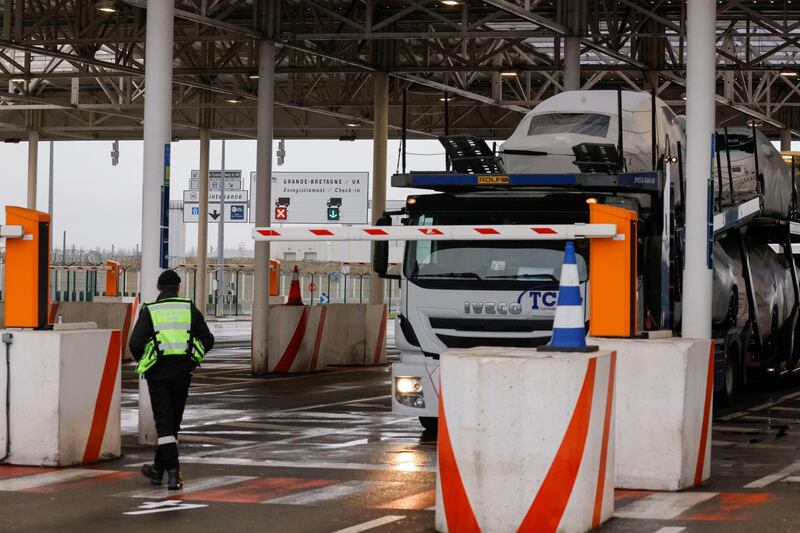 The Pit Stop at the Eurotunnel, where lorries are checked before boarding the Shuttle Freight from France to Britain, is seen in Coquelles near Calais, after France barred all people coming from the United Kingdom, for 48 hours from Sunday night, over fears of a new strain of the coronavirus, amid the spread of the coronavirus disease (COVID-19) in France, December 22, 2020. REUTERS/Pascal Rossignol