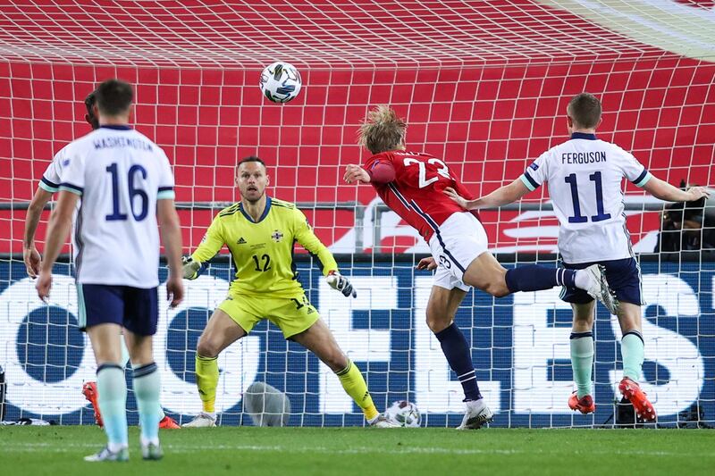 Norway's forward Erling Braut Haaland heads the ball towards Northern Ireland's goalkeeper Trevor Carson's goal during the UEFA Nations League football match Norway v Northern Ireland in Oslo, Norway, on October 14, 2020. (Photo by Orn E. BORGEN / NTB / AFP)