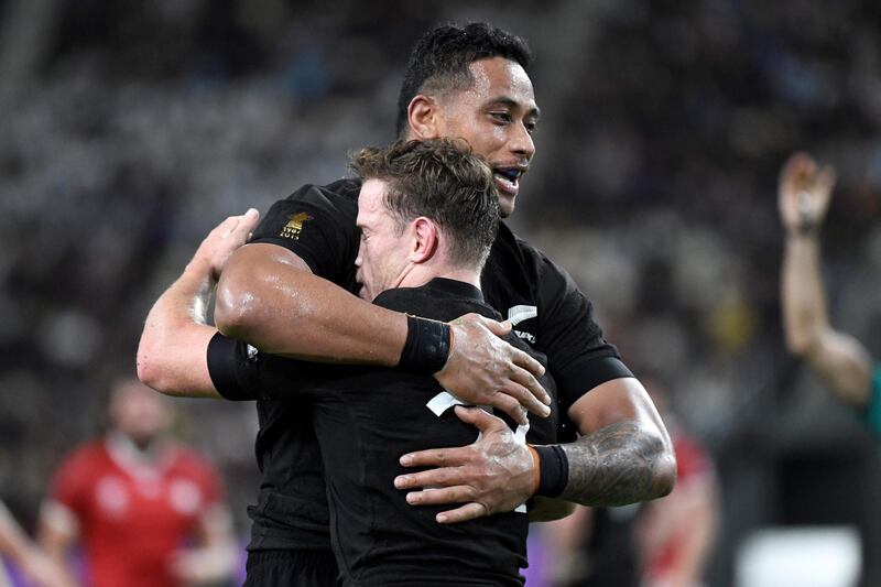 New Zealand's scrum-half Brad Weber (R) celebrates after scoring a try during the Japan 2019 Rugby World Cup Pool B match between New Zealand and Canada at the Oita Stadium in Oita on October 2, 2019. / AFP / CHRISTOPHE SIMON
