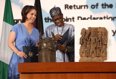 Nigerian Culture Minister Layiwola Mohammed and German Foreign Minister Annalena Baerbock in 2022 signed an agreement of intent to return the Benin Bronzes to Nigeria. AFP