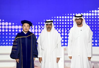 From left, Dr Eric Xing, Chief executive of Mohamed bin Zayed University of Artificial Intelligence, Sheikh Hamed in Zayed Al Nayhan, Managing Director of Abu Dhabi Investment Authority, and Dr Sultan Al Jaber, UAE Minister of Industry and Advanced Technology. Khushnum Bhandari / The National
