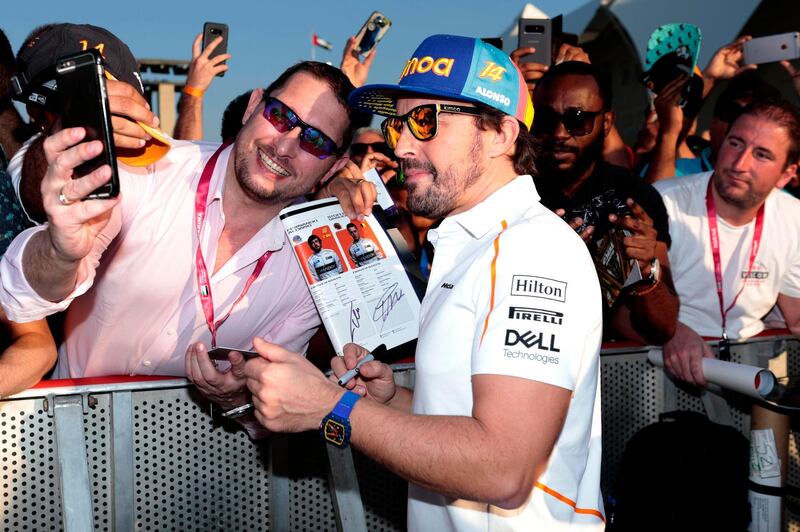 Fernando Alonso greets his fans during an exclusive autograph signing session at Yas Marina Circuit. Courtesy Yas Marina Circuit