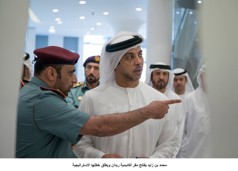 ABU DHABI, UNITED ARAB EMIRATES - September 20, 2017: HH Sheikh Mansour bin Zayed Al Nahyan, UAE Deputy Prime Minister and Minister of Presidential Affairs (C), tours the Rabdan Academy during the inauguration. 
 ( Mohamed Al Hammadi / Crown Prince Court - Abu Dhabi )
---