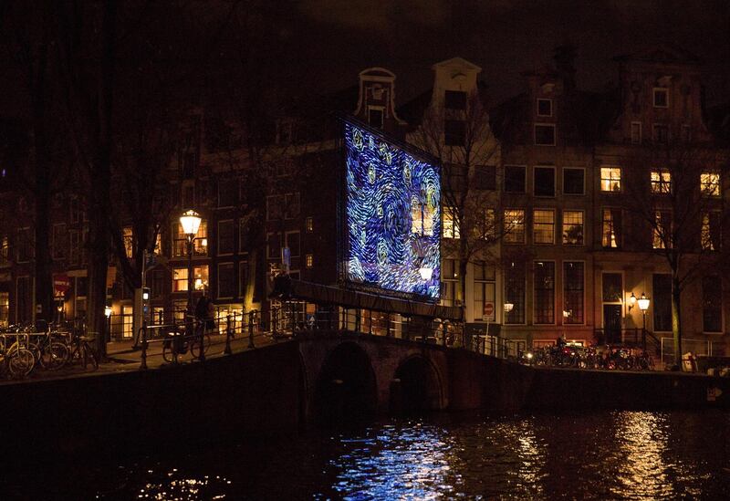 Starry Night by Ivana Jelic and Pavle Petrovic is seen during a boat tour of the Amsterdam Light Festival in Amsterdam, Netherlands, Thursday, Nov. 29, 2018. (AP Photo/Peter Dejong)