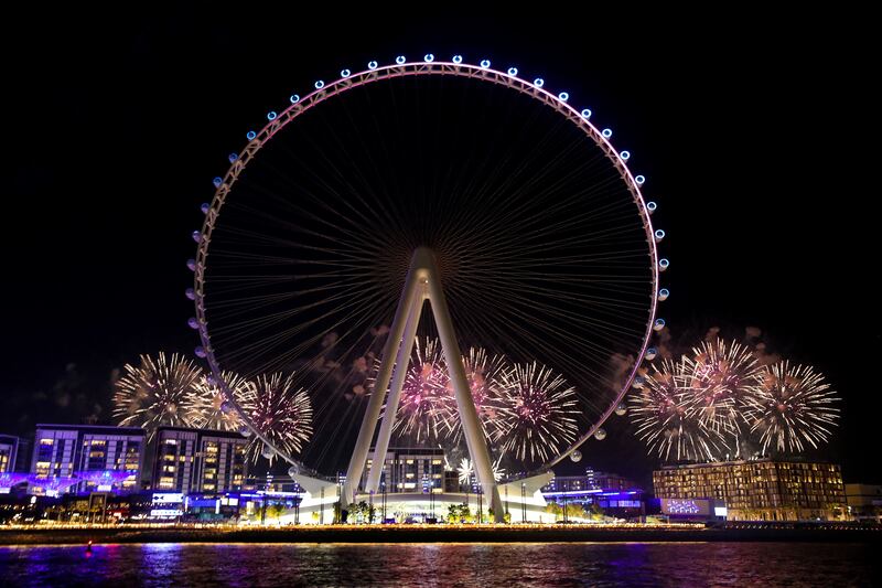 Fireworks and a light show herald the opening of the 250-metre-tall observation wheel