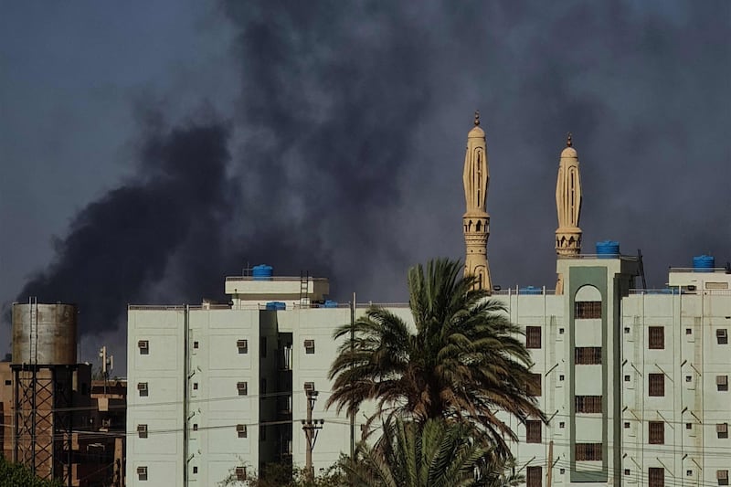 Smoke billows above buildings in southern Khartoum amid fighting between the army and the Rapid Support Forces paramilitary. AFP
