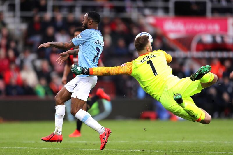 Artur Boruc of AFC Bournemouth dives to make a save infront of Raheem Sterling of Manchester City. Getty Images