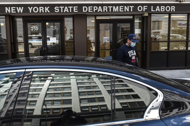 NEW YORK, NY - MAY 07: Luis Mora stands in front of the closed offices of the New York State Department of Labor on May 7, 2020 in the Brooklyn borough in New York City. 3.2 million Americans have filed for unemployment insurance this week bringing the total number of workers who have applied for aid to 33 million in the past two months.   Stephanie Keith/Getty Images/AFP
== FOR NEWSPAPERS, INTERNET, TELCOS & TELEVISION USE ONLY ==
