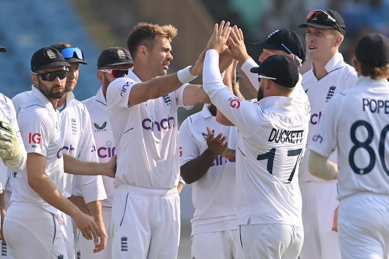 James Anderson of England celebrates with teammates after dismissing Kuldeep Yadav of India. Getty Images