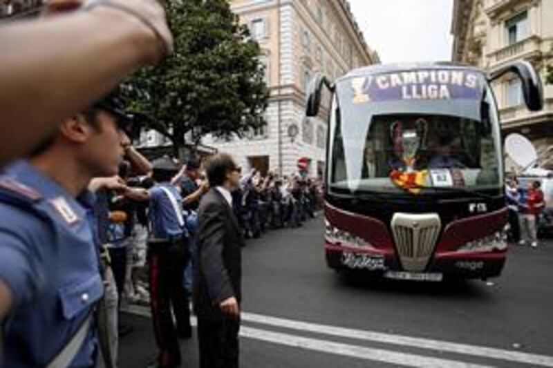 Barcelona players celebrate with a bus tour after beating Manchester United 2-0 in the final of the Champions League.