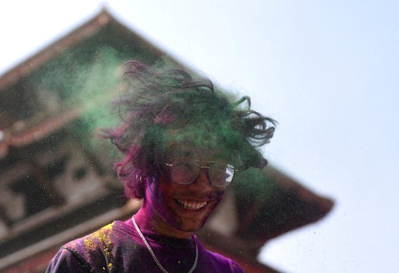 A man reacts while celebrating Holi, in Kathmandu, Nepal. Reuters