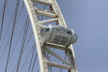 The first of 48 capsules is now visible on Dubai's big wheel on Bluewaters Island. Pawan Singh / The National